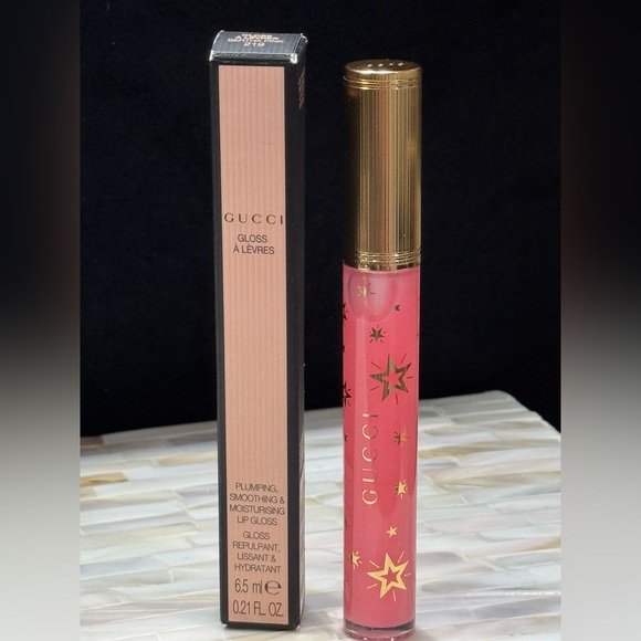 Gucci Hydrating Lip Gloss in Shade 219 Bertha Pink - Picture 1 of 5